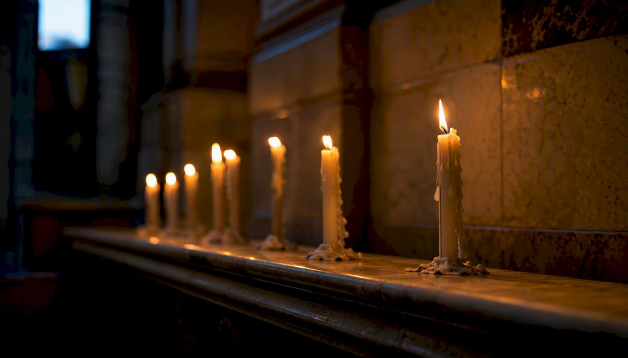 Candles flickering on church altar