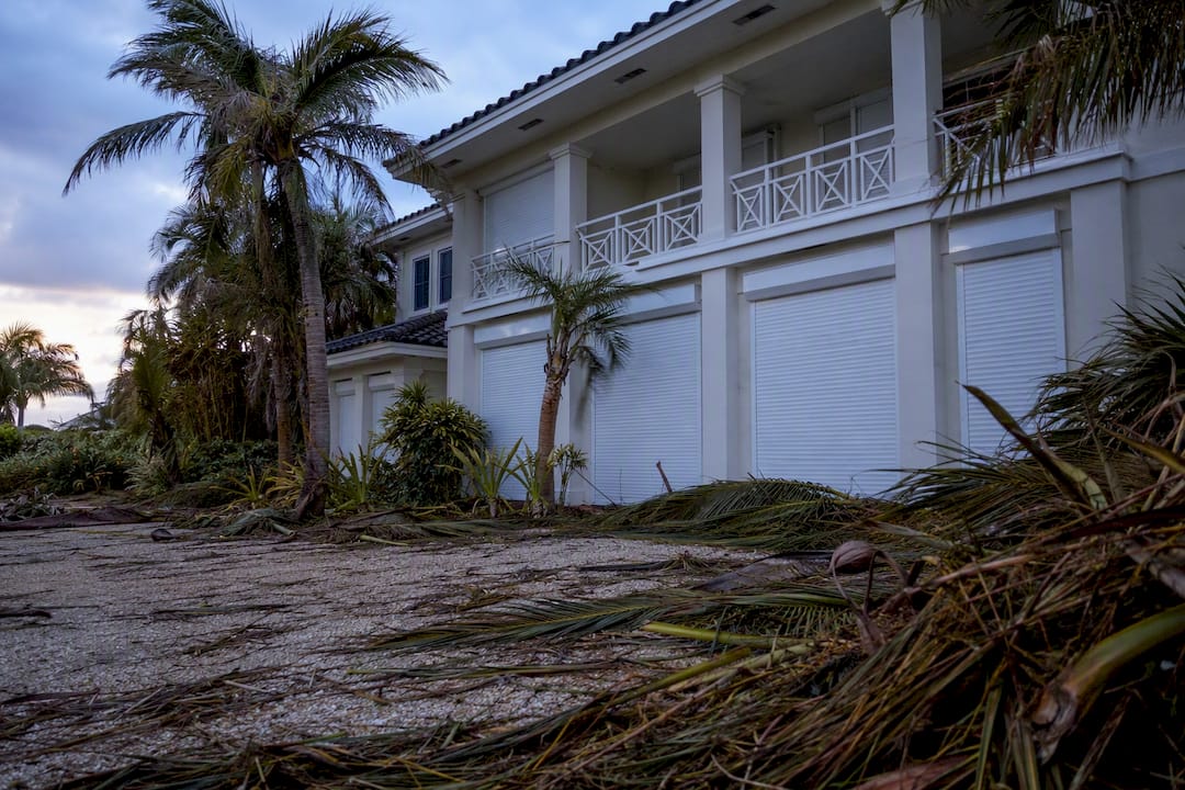 Vacation rental home with hurricane shutters closed