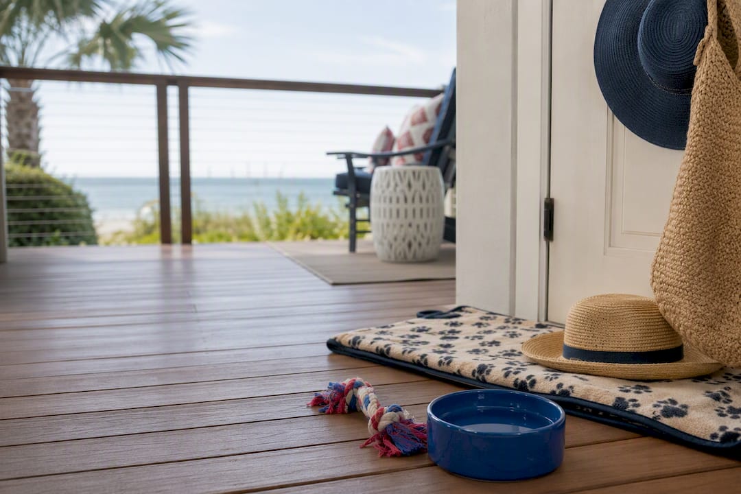Beachfront rental porch with dog accessories