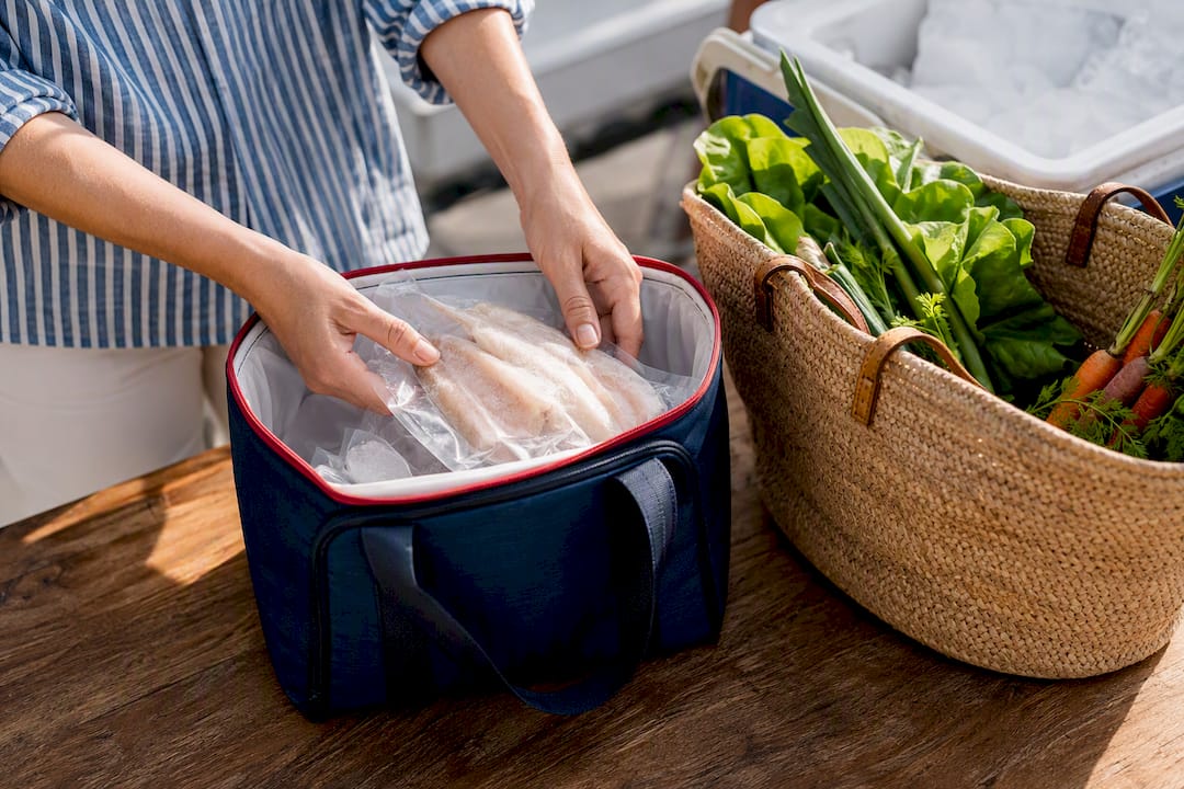 Insulated bag beside fresh market produce