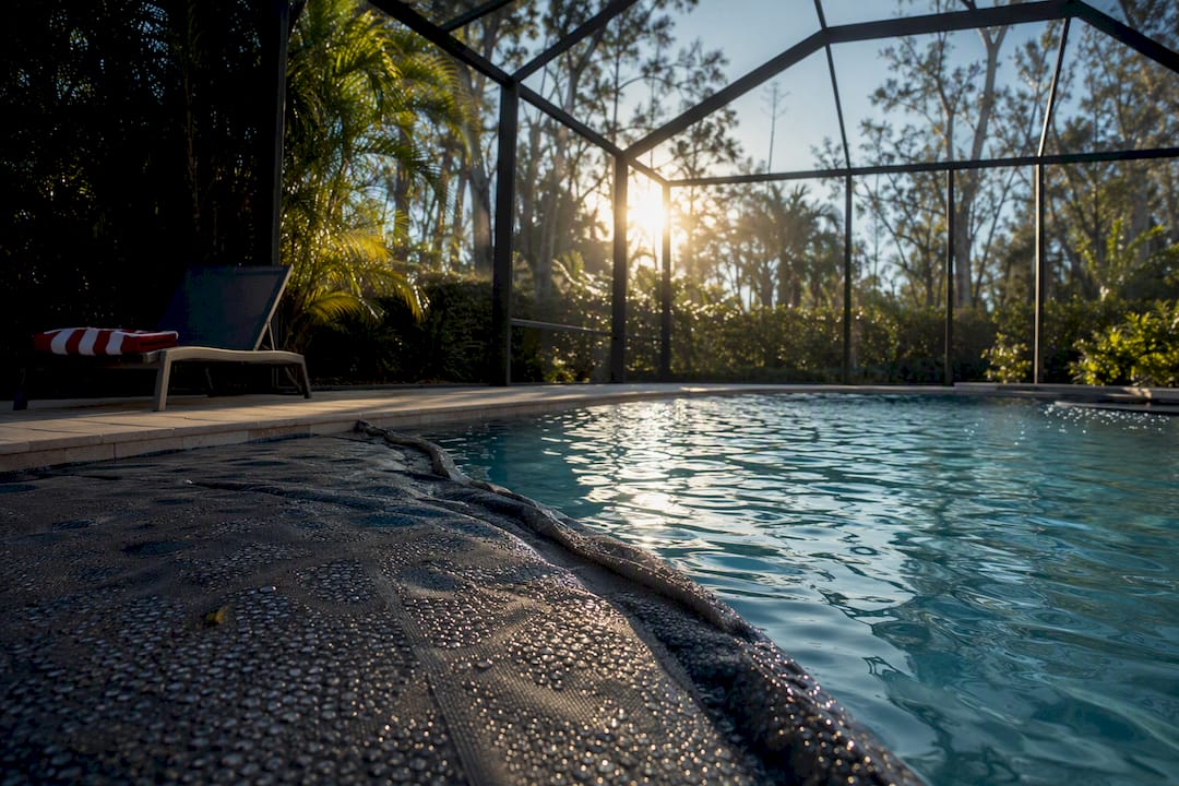 Screened Captiva pool with partially opened cover
