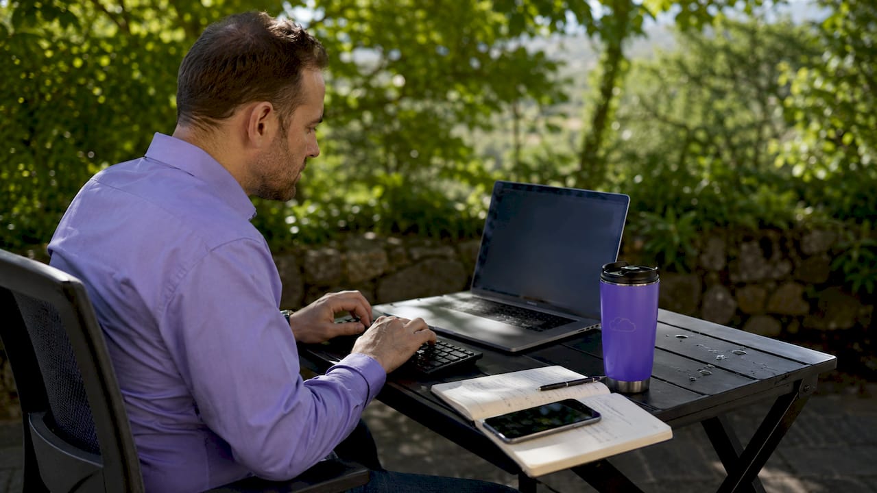 Trader at desk working on automation software