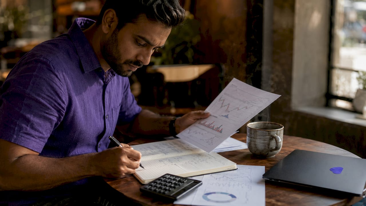 Trader reviewing inverted trade calculations