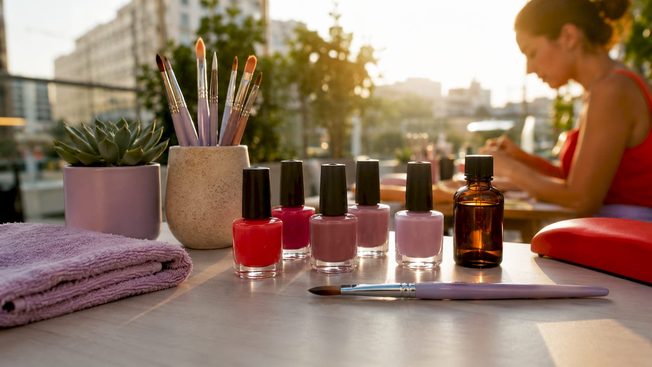 Professional nail art brushes and tools on table