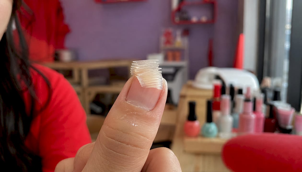 Close-up layered keratin nail plate structure
