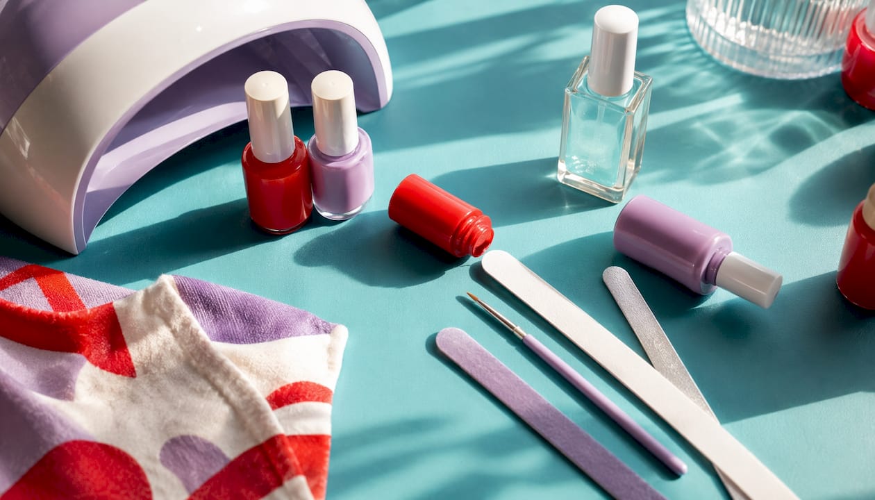 Flat lay of gel polish manicure tools