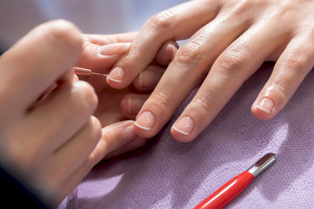Micro-French design on short natural nails