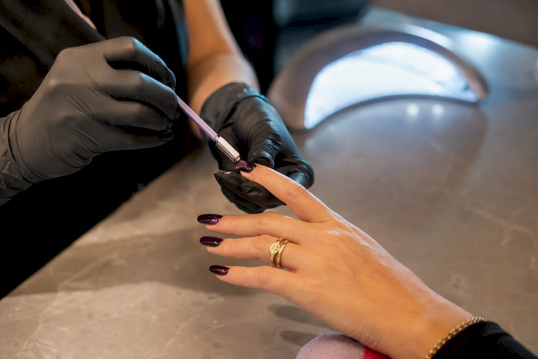 Technician shaping velvet magnetic gel shimmer