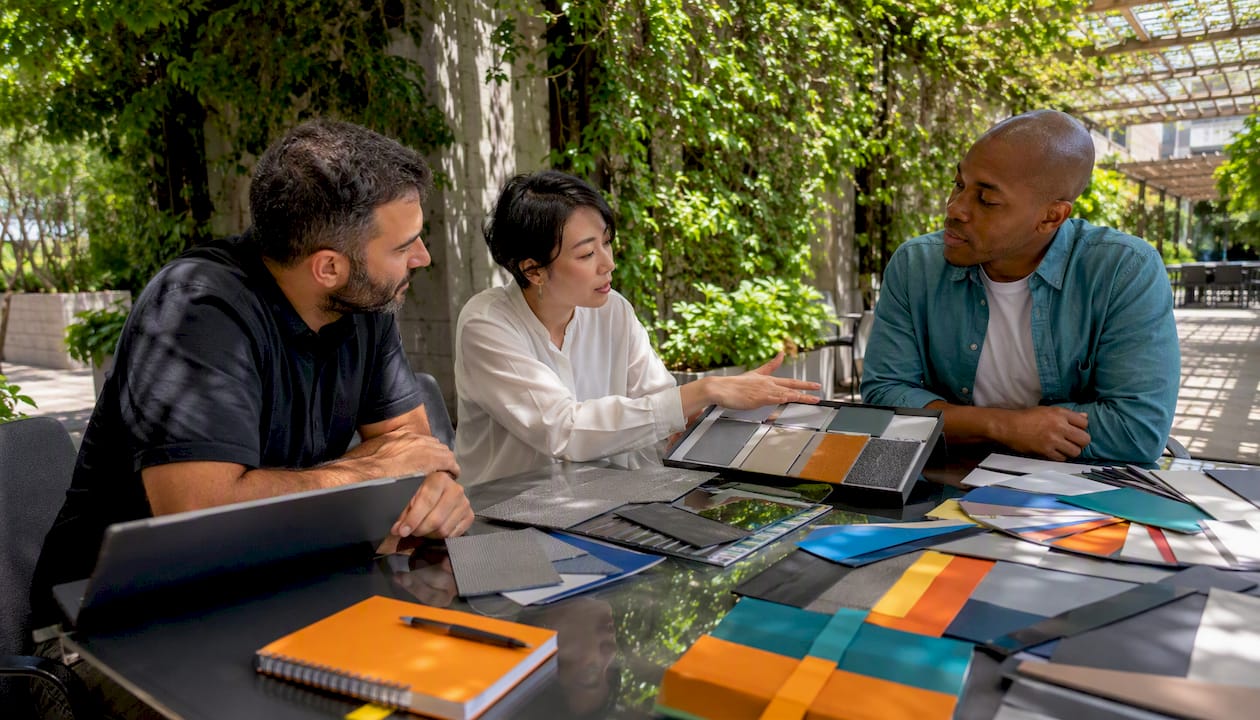 Designers reviewing indoor and outdoor signage samples