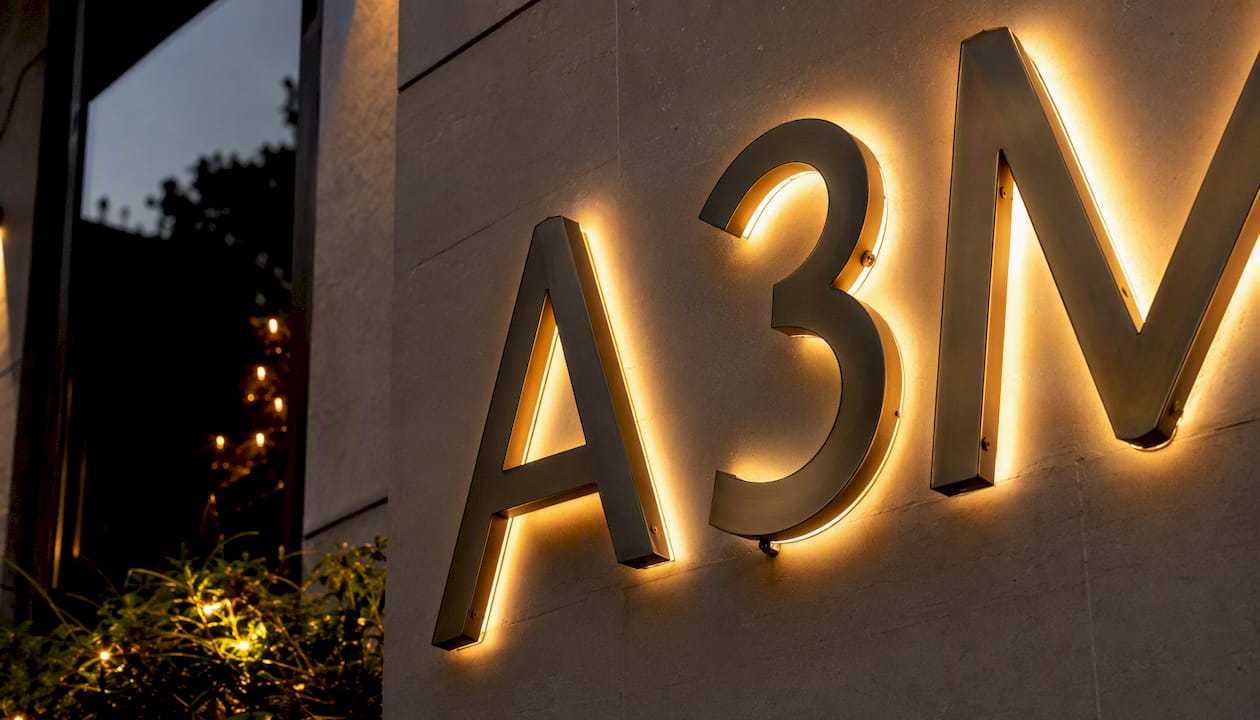 Halo illuminated built-up letters on restaurant wall