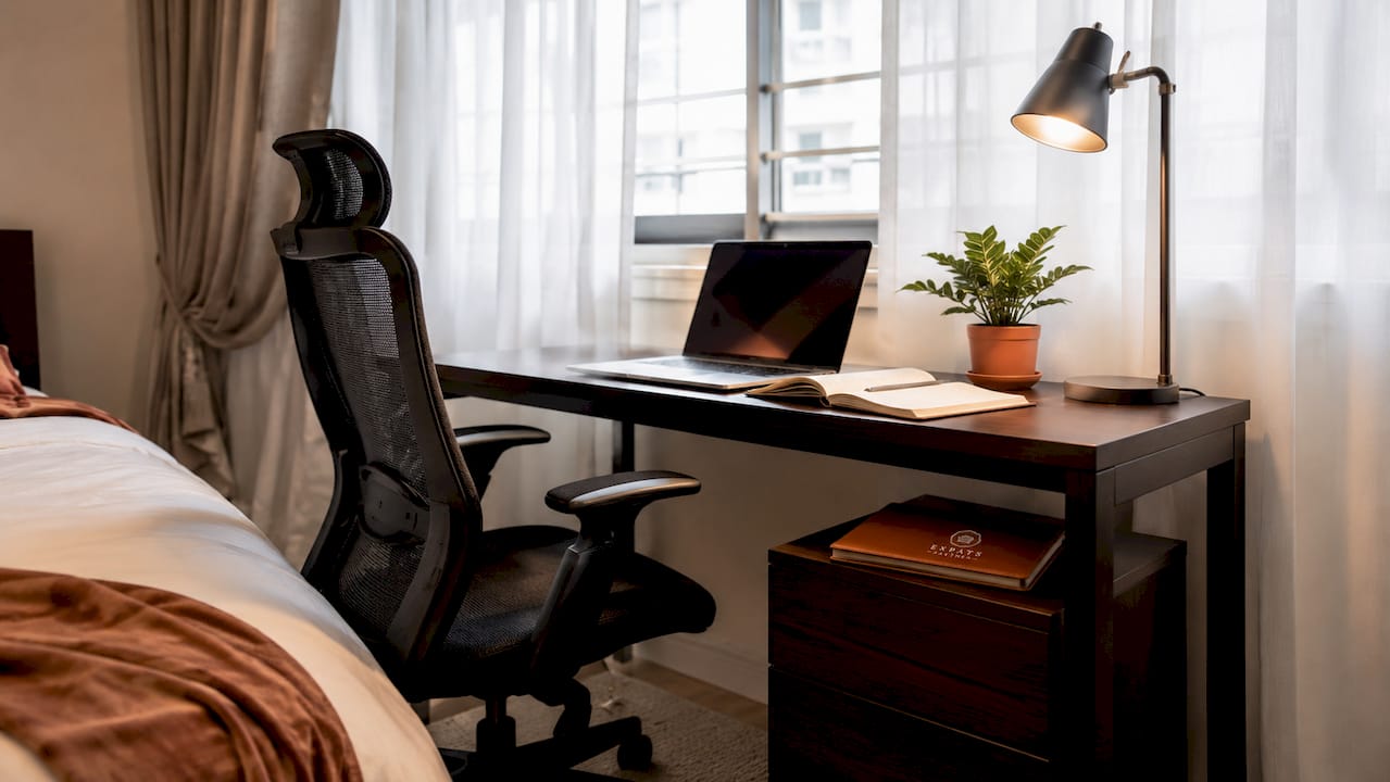 Spare bedroom staged as home office in Singapore flat