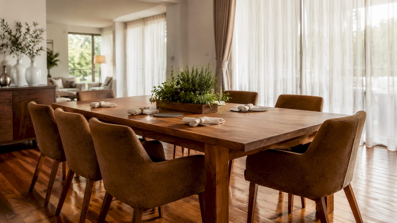 Dining area with 220cm table and chairs in bungalow