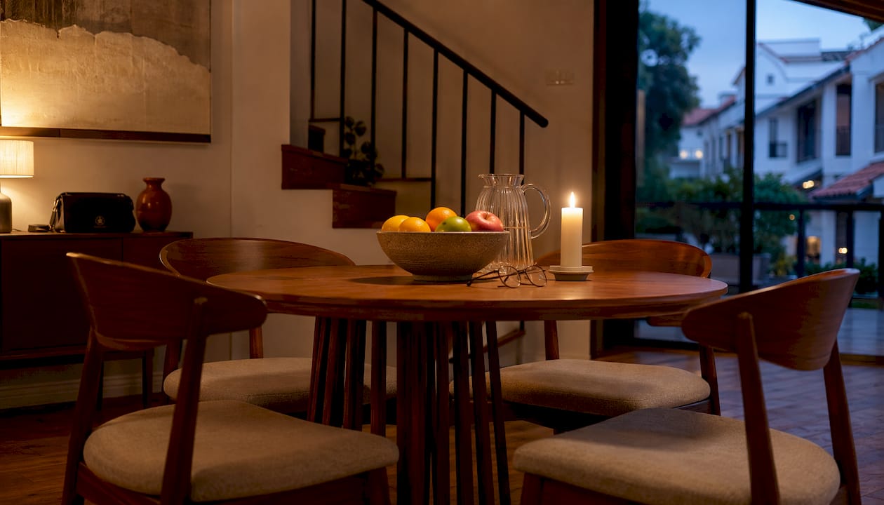 Singapore townhouse dining area with brochures on table
