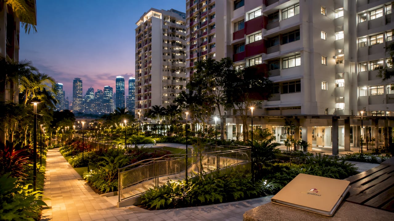 Modern Singapore HDB and condo buildings at golden hour