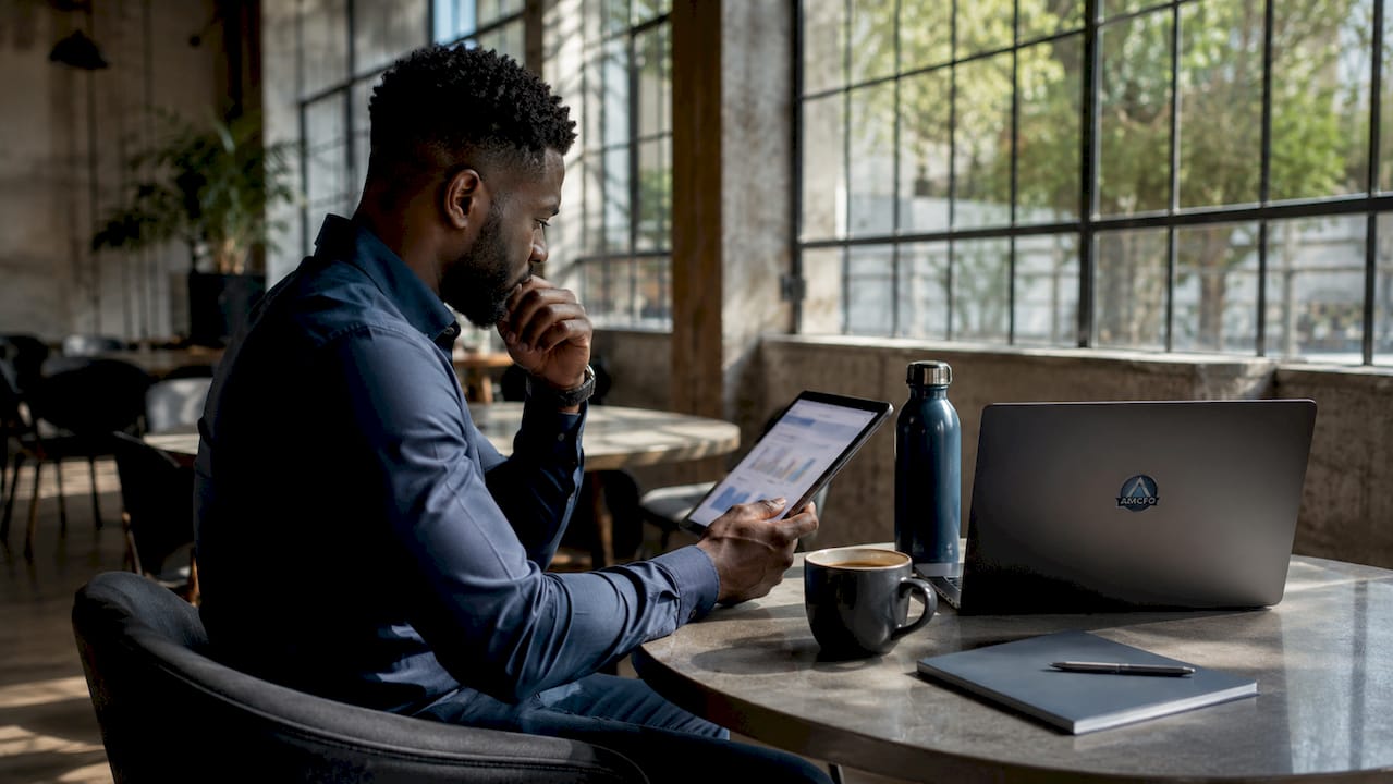 Hands using tablet for AI analytics