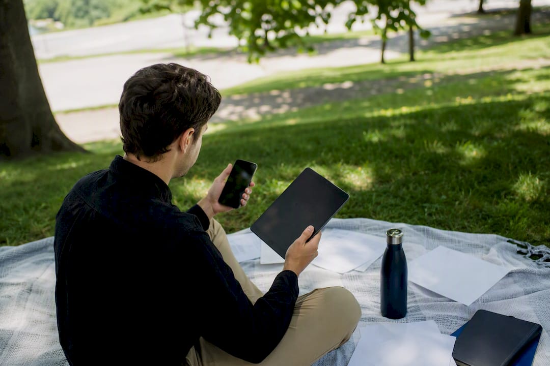 Person managing franchise SEO tasks at desk
