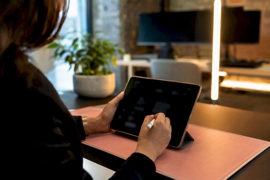 Hands adjusting CRM input settings