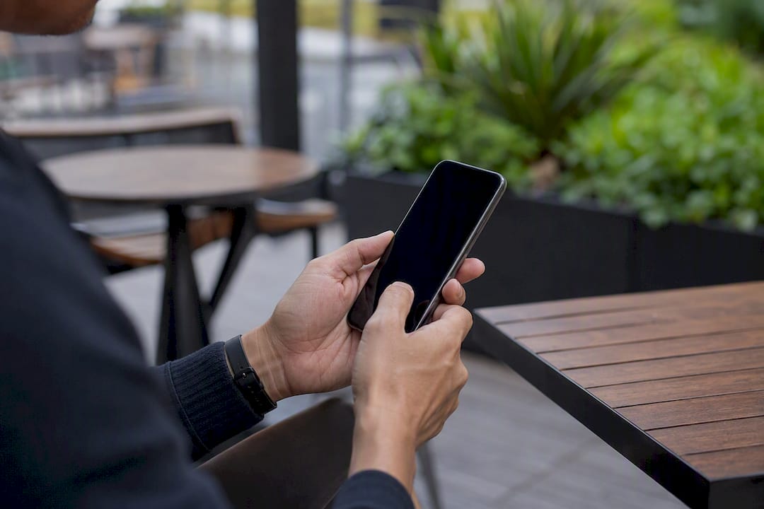 Hand typing SMS confirmation reply