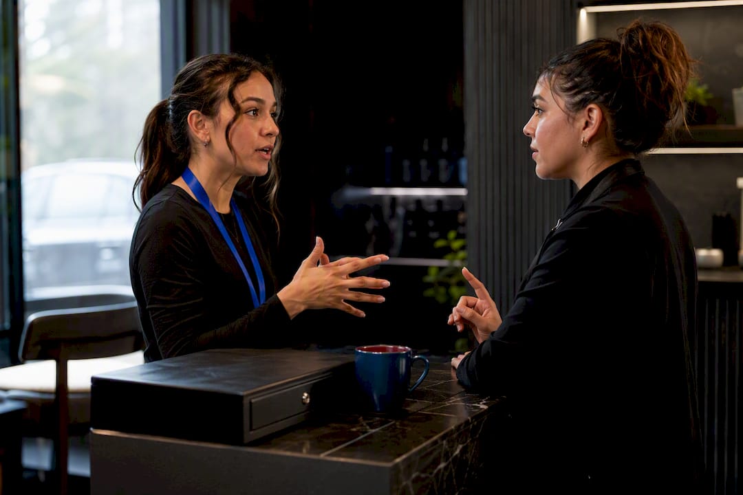 Salon staff rehearsing loyalty enrollment script