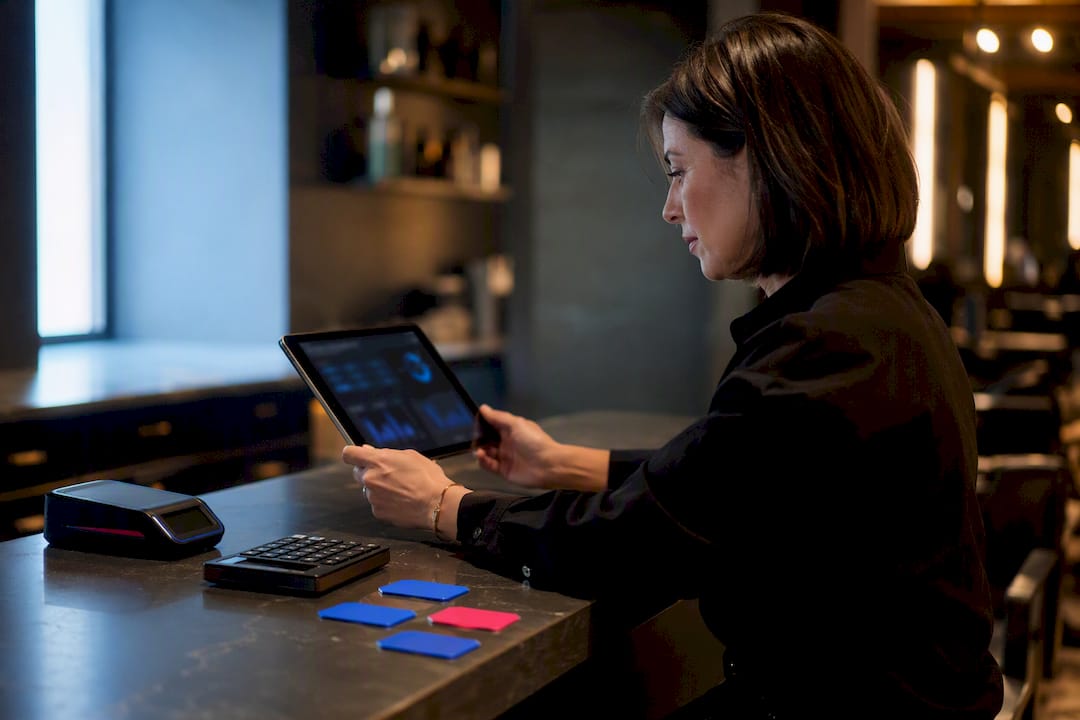 Salon owner reviewing weekly analytics dashboard