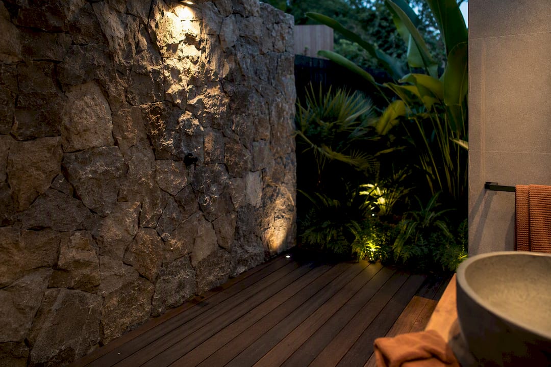 Outdoor bathroom teak wood and stone corner