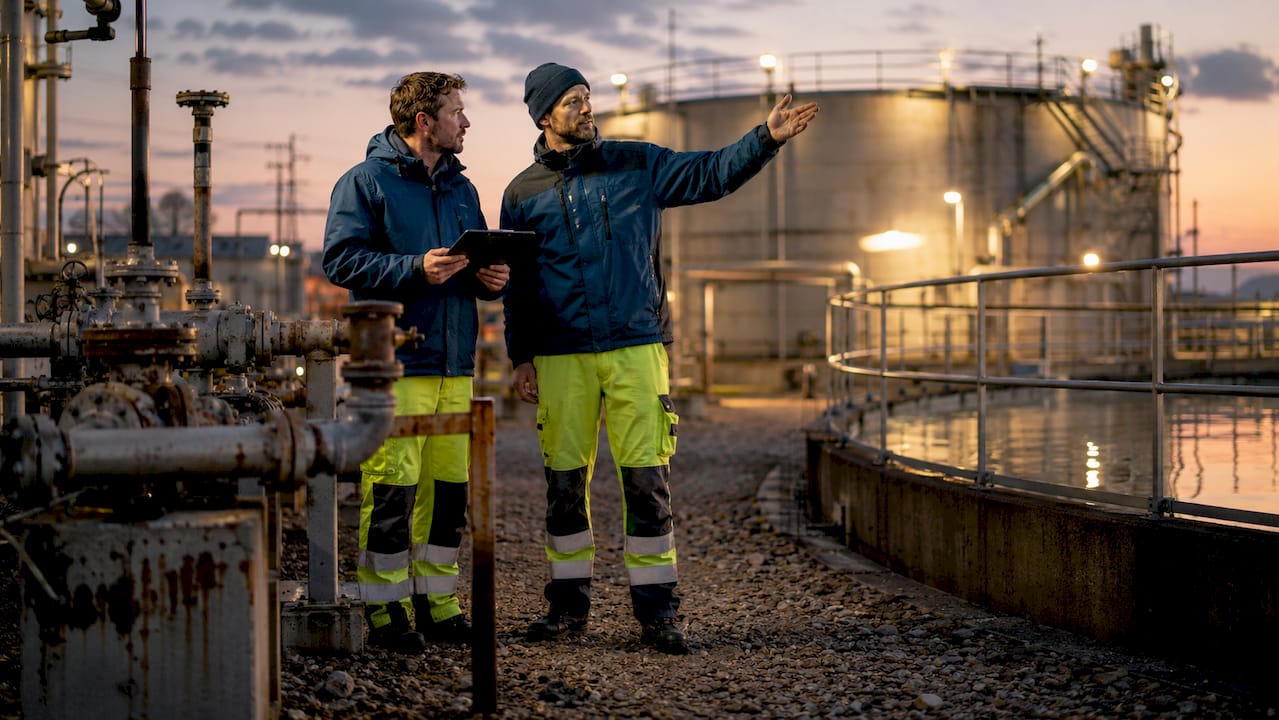 Engineers assessing water treatment plant infrastructure