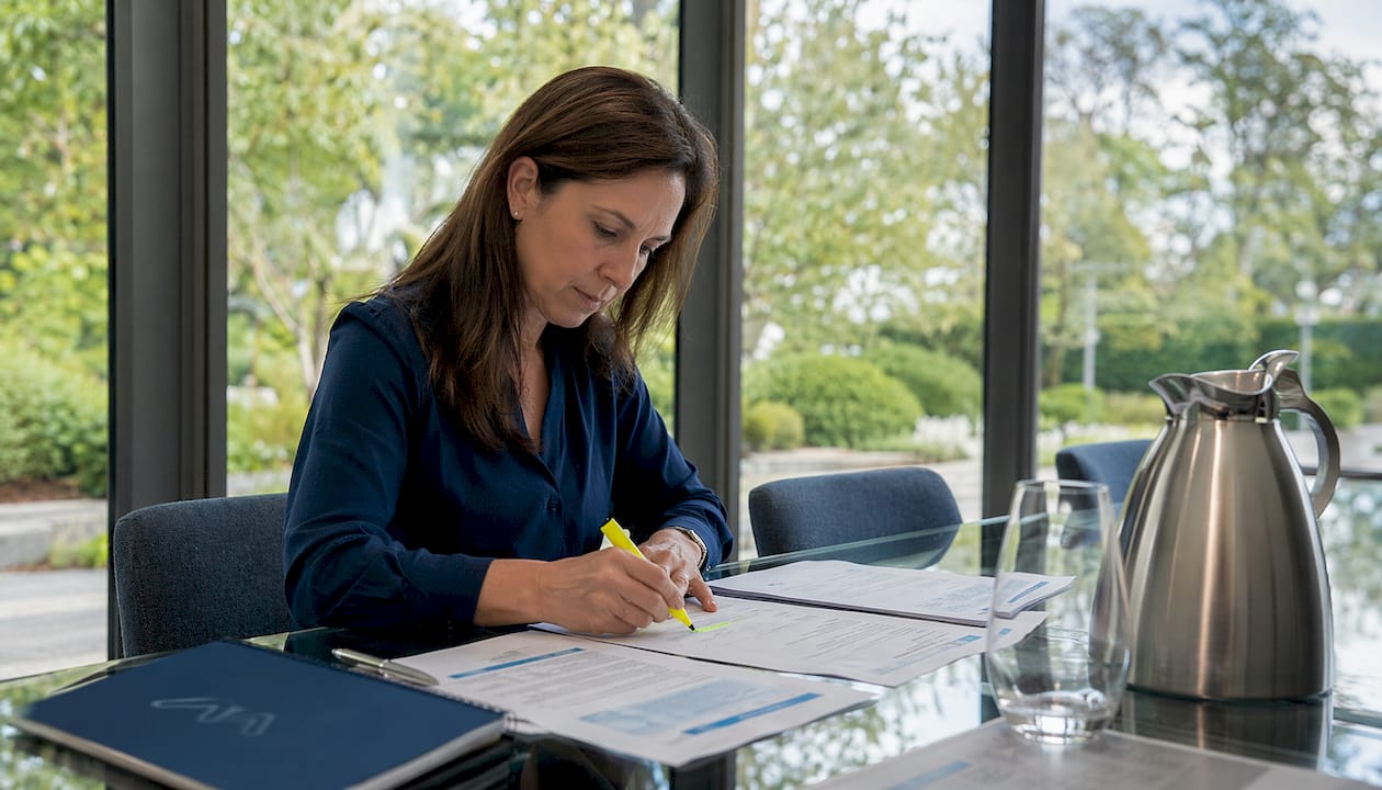 Healthcare worker reviewing water risk documents