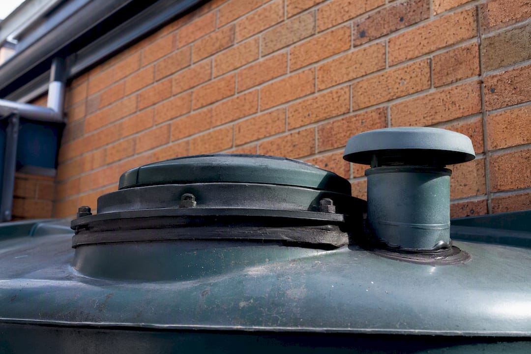 Rainwater tank sealed inspection hatch and vent