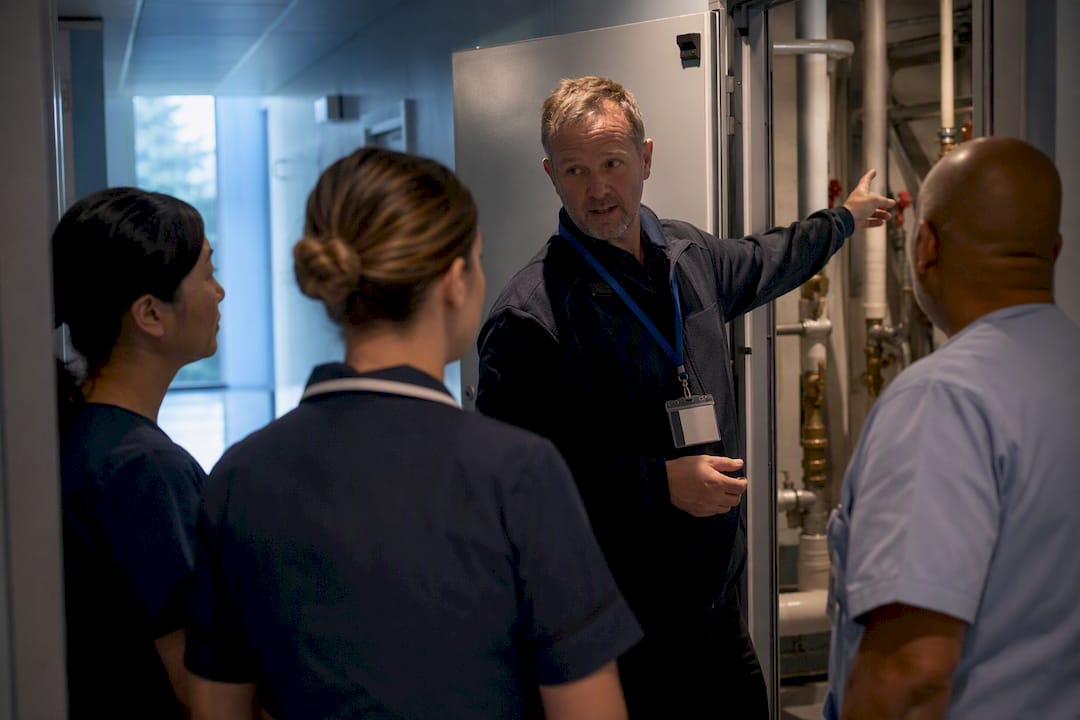 Trainer leading on-site water hygiene training