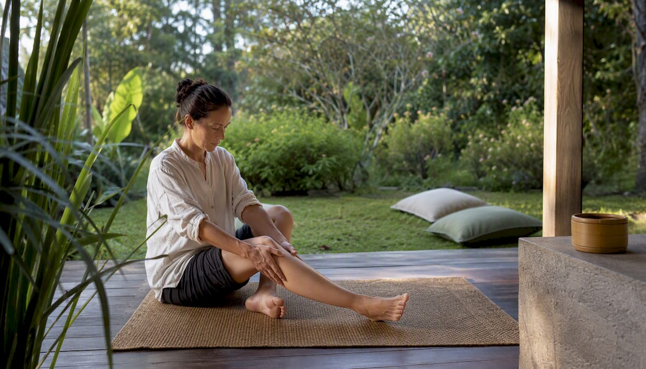 Three stages of a qigong meditation session indoors