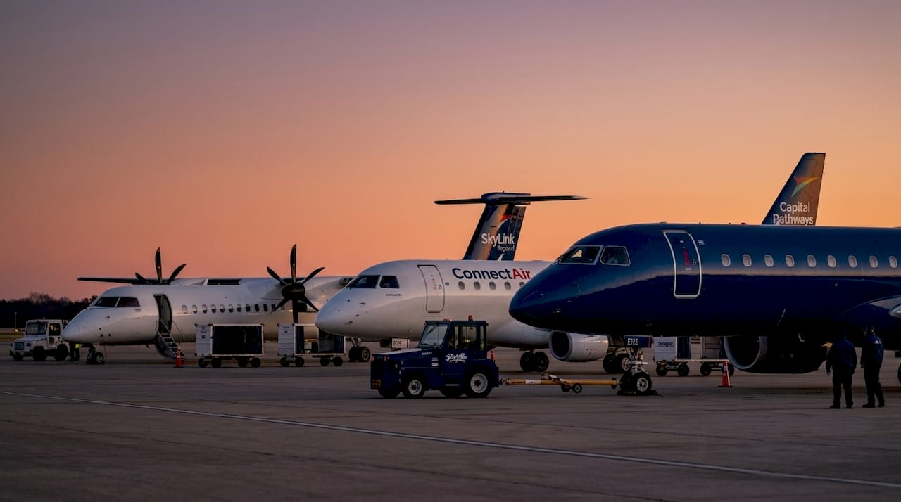 Various regional airline aircraft types on airport ramp