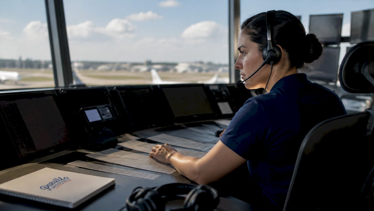 Air traffic controller working in control tower