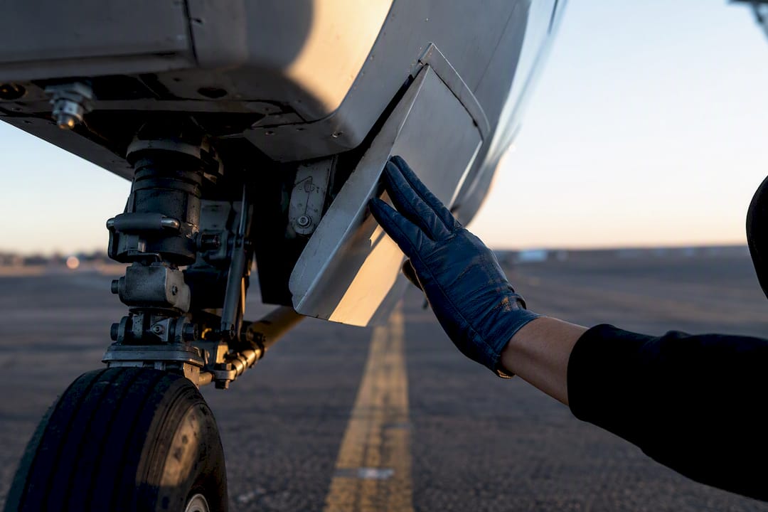 Student pilot checking retractable landing gear