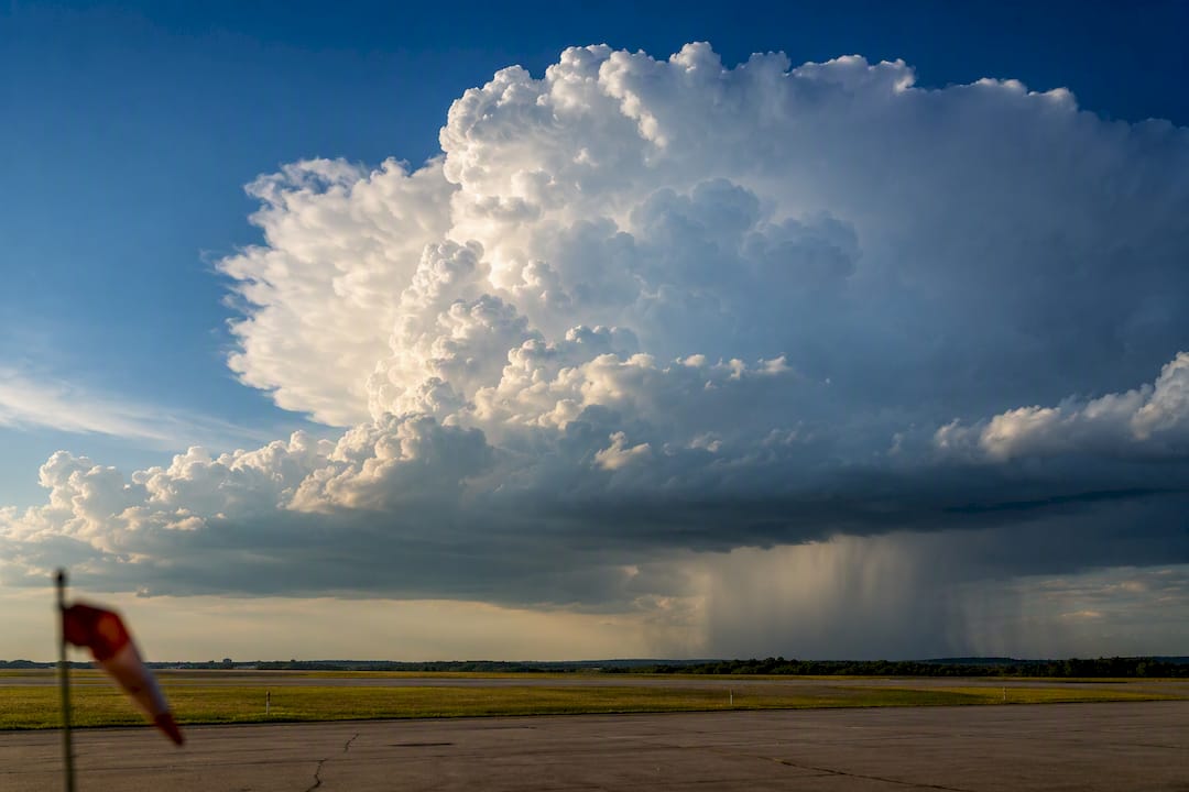 Thunderstorm cloud beyond training airport