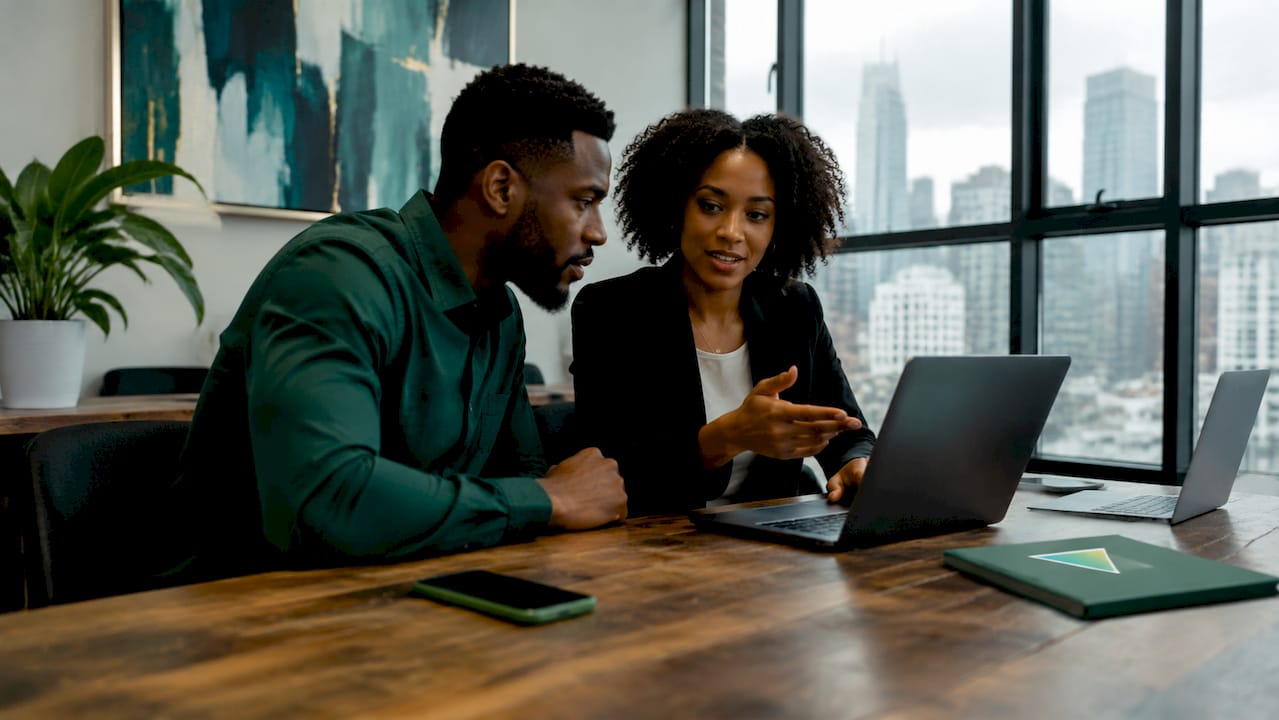 Sales team collaborating with online CRM tools