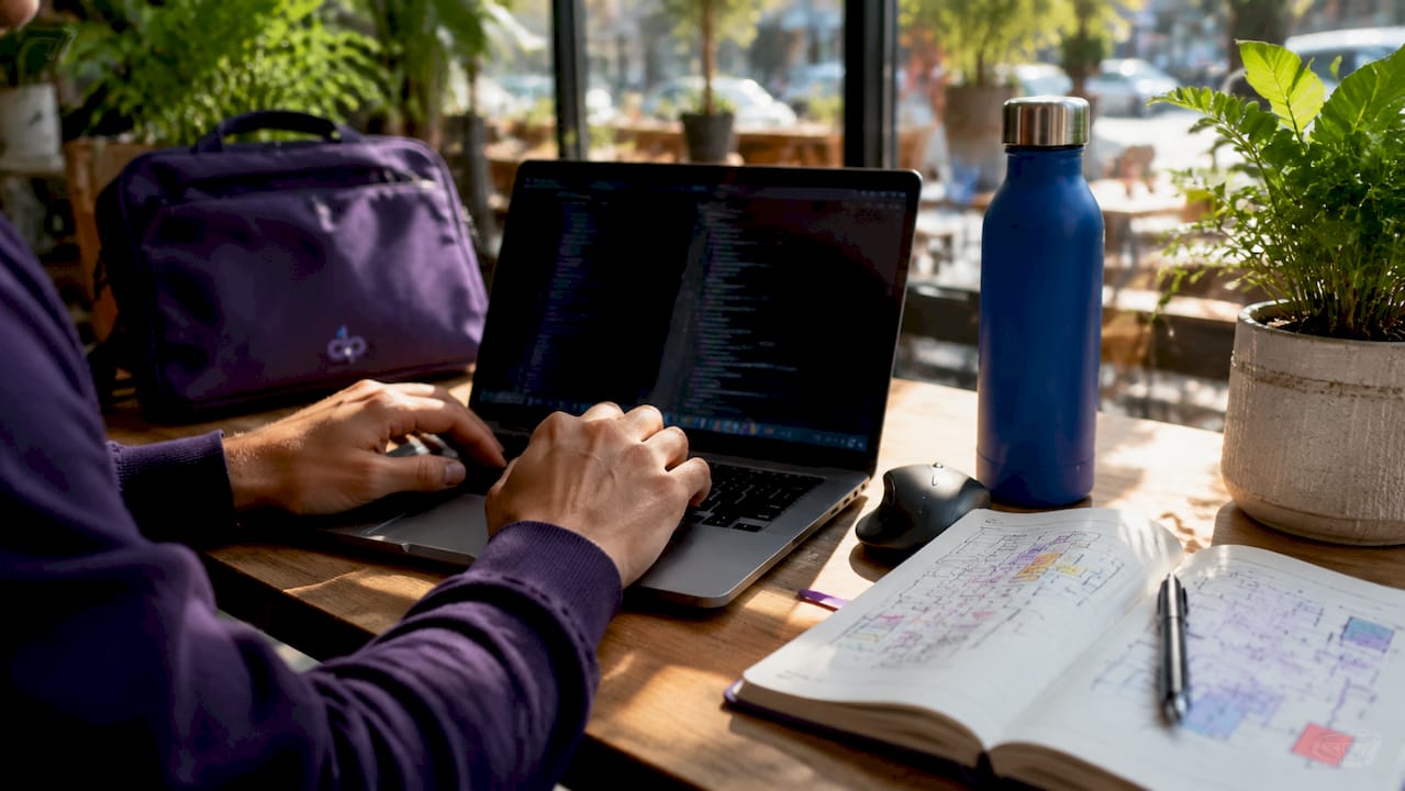 Developer typing code for AI data extraction
