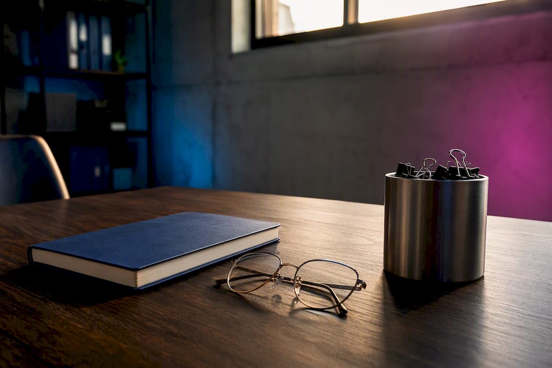 Office desk with eyeglasses and governance tools