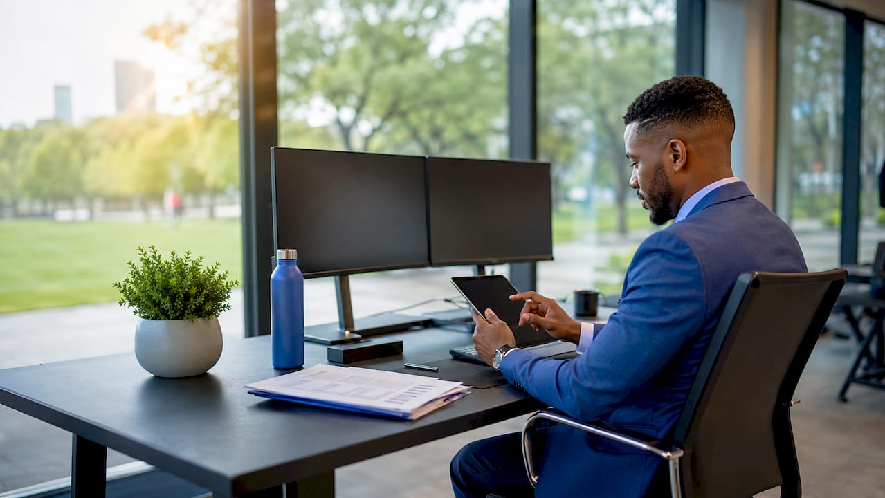Financial manager analyzing data in office