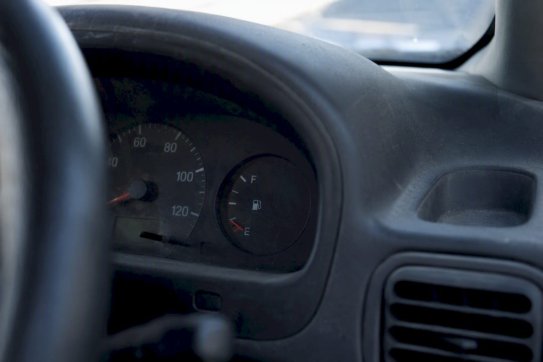 Vehicle fuel gauge near empty