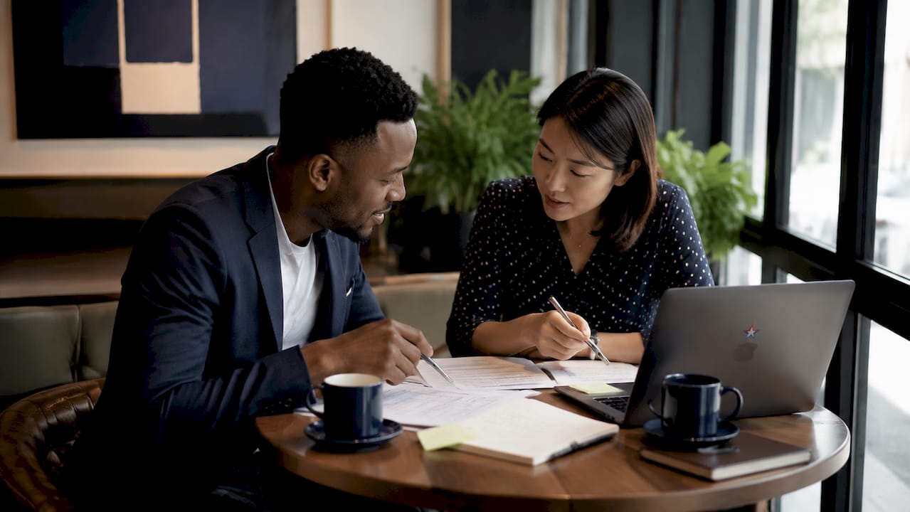 Colleagues discussing office move savings