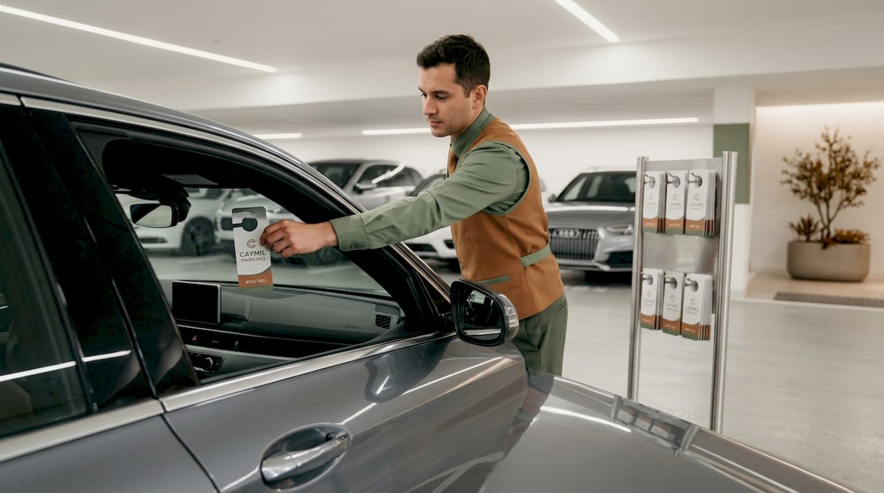 Valet installs RFID hang tag in car