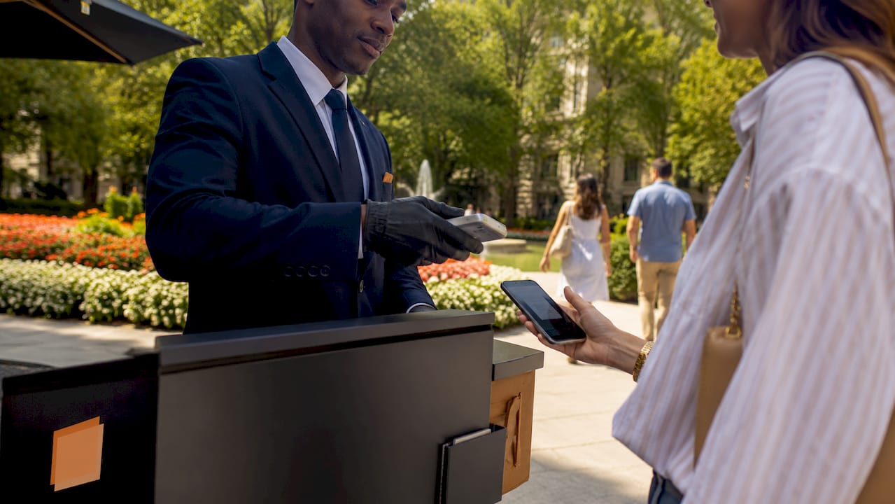 Valet attendant scanning digital QR ticket