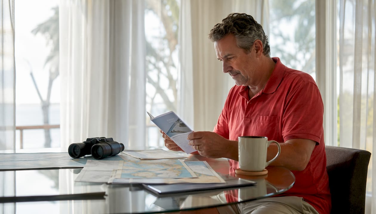 Man studying boating safety certification materials