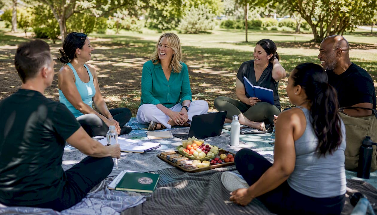 Diverse weight loss group in lively discussion