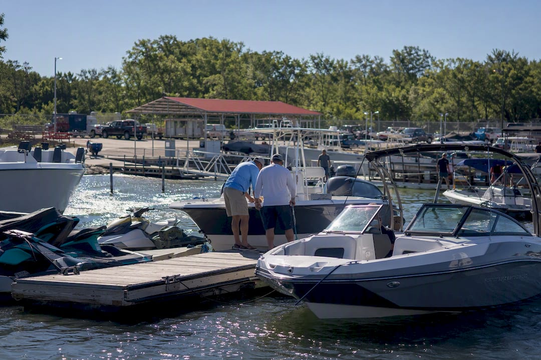 Marina docks with boats moored at slips