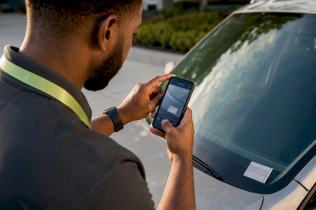 Operator checking permit visibility by phone