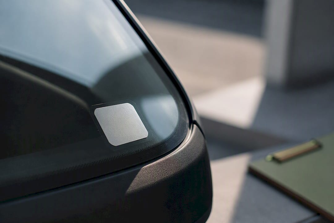 Parking permit decal attached to windshield