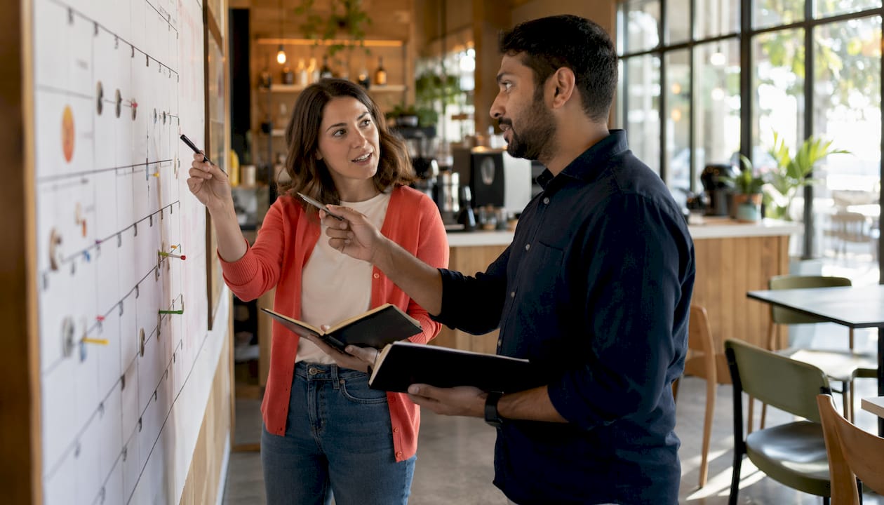 Marketing professionals discussing agile frameworks