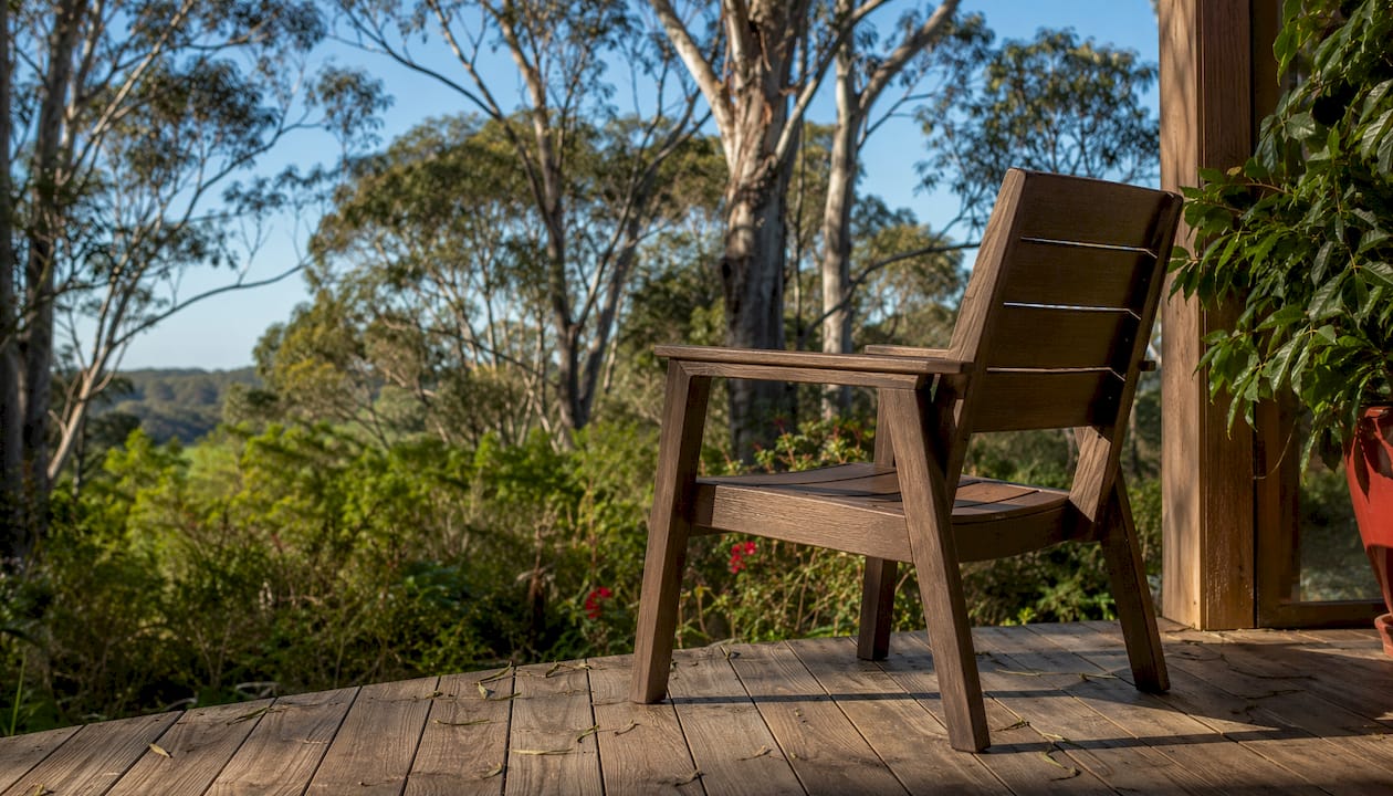 Close-up of Keter teak-look resin chair on patio