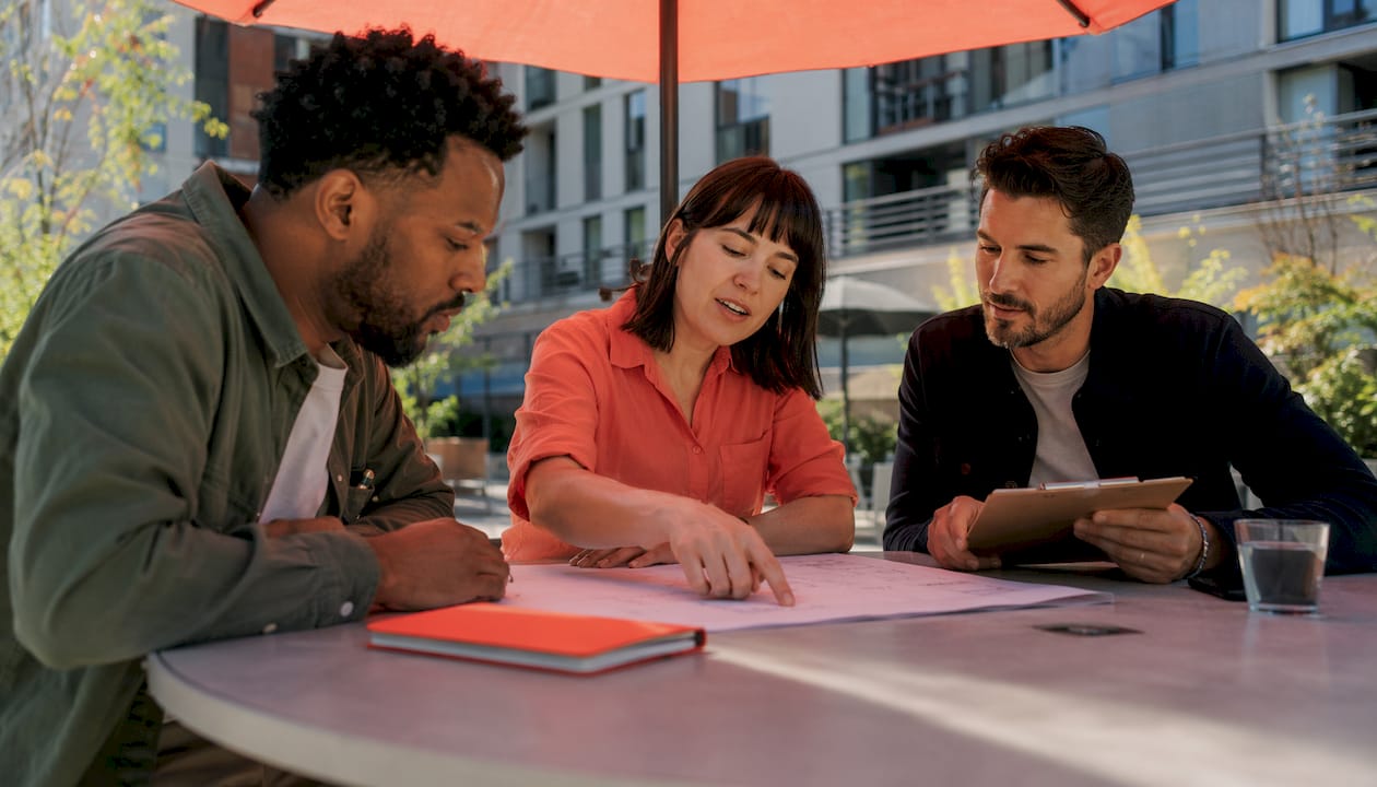 Marketing team discussing ad optimization plan